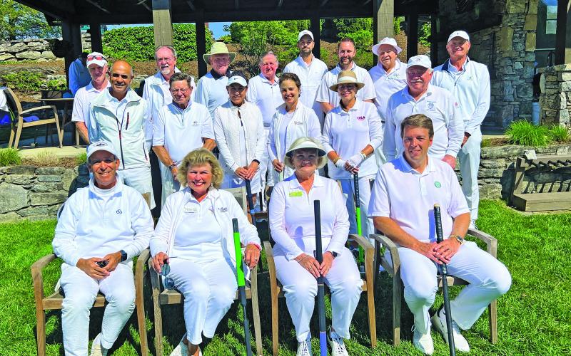 Submitted Photo Front row seated left to right, Michael Albert – First Vice-President/United States Croquet Association (Cedar Creek) Kathie Gamble – Chairman for 2022 GC National Tourn. (Trillium) Lynda Fuchs – Highlands Falls Venue Manager and Jochen Lucke – President of Silver Creek Realty, sponsor of GC National Tournament (CCSV and Cullasaja). Middle row seated left to right, Sherif Abdelwahab (Wildcat Cliffs) Don Eastman (Highlands Falls) Dawn Jupin (Chattooga) Barbara Jamison (Trillium) Ellen Nielson