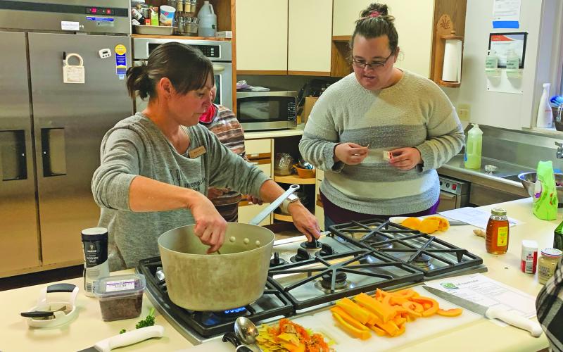 Jenna Kranz (left), from Uncomplicated Kitchen in Sylva, is teaching classes focused on making a Thanksgiving meal on a budget for families on the Highlands-Cashiers Plateau.