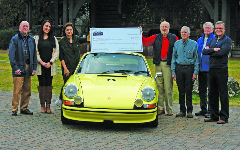 Representatives of the Highlands Motoring Festival presented a check to three area nonprofit on Thursday.