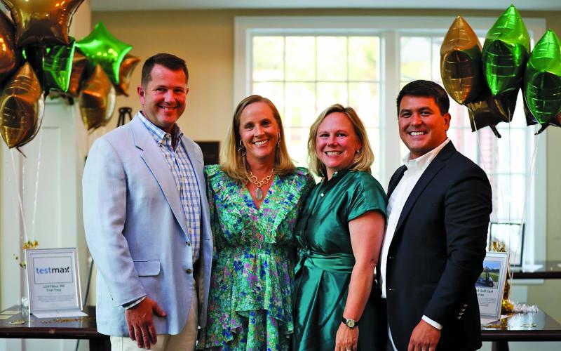 Frank and Bethany Weisser, left, and Sarah and Jonathon Barge at the Green and Gold Gala at Rabun Gap-Nacoochee School. Bethany and Sarah served as co-chairs on the gala’s volunteer committee.