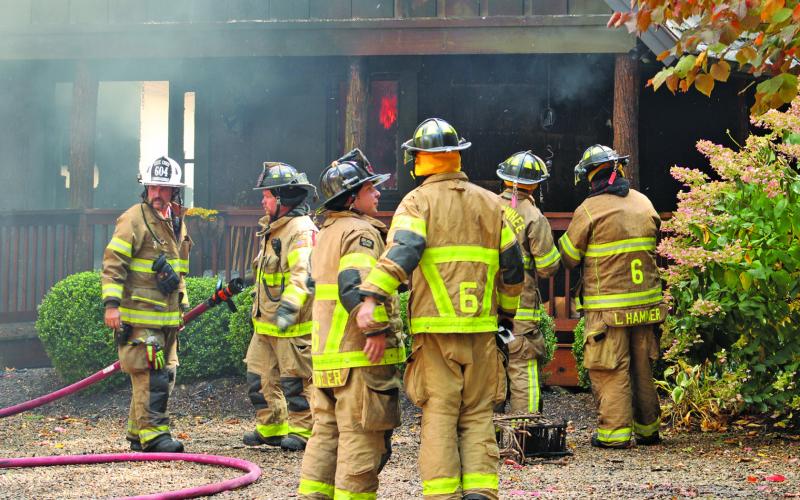 Firefighters from Cashiers-Glenville, Highlands, Cullowhee and Lake Toxaway battled a fire on Trillium Ridge on Oct. 10. The fire most likely started in the chimney, according to CGFD Chief Randy Dillard.