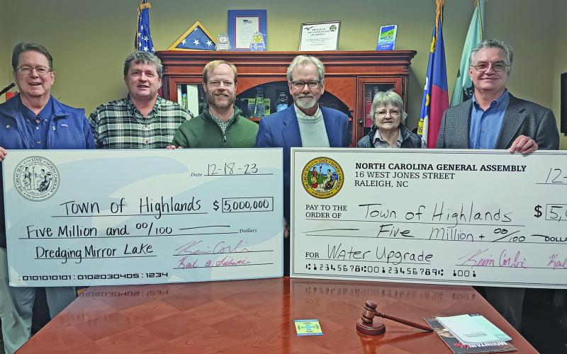 North Carolina Sen. Kevin Corbin (R-Macon) and Rep. Karl Gillespie (R-Macon) delivered a pair of checks for $5 million each to the Town of Highlands last week. The state funds will cover a new clarifier tank at the water treatment plant, and the dredging of Mirror Lake.